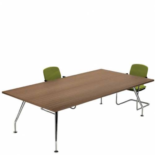Two green chairs around a wooden meeting table